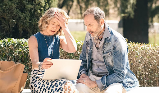 Victims of real estate fraud realizing the financial cost of deceptive land sales.