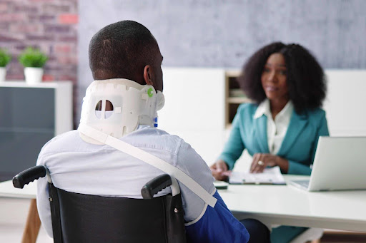 A man in a neck brace suffering injuries from defective products, which could provide grounds for a product liability lawsuit.